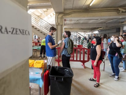 A second shot of AstraZeneca is administered in a sports stadium in Murcia, southern Spain.