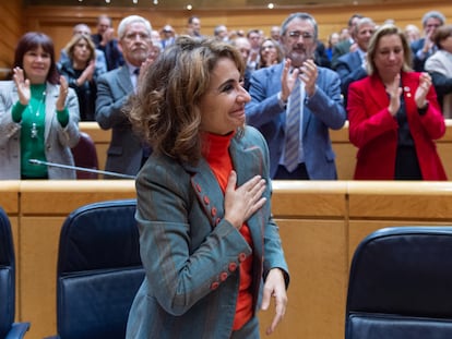 La ministra de Hacienda y Función Pública, María Jesús Montero, celebra la aprobación de los Presupuestos, este martes en el Senado.