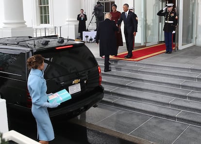 Melania and Donald Trump are greeted by Barack and Michelle Obama upon their arrival at the White House for the inauguration, January 20, 2017.