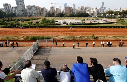 People watch a horse race at Beirut Hippodrome, Lebanon, April 30, 2017. REUTERS/Jamal Saidi  SEARCH "SAIDI HIPPODROME" FOR THIS STORY. SEARCH "WIDER IMAGE" FOR ALL STORIES.