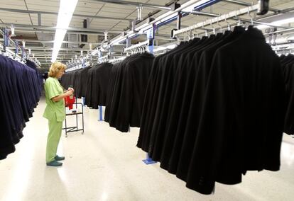 A woman works at the Zara factory at the headquarters of Inditex group in Arteixo, northern Spain