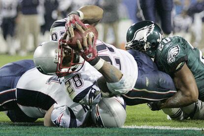 Los jugadores de los Patriots consiguen un <i>touchdown</i>.