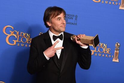 Richard Linklater celebra el Globo de Oro al mejor director por 'Boyhood'.