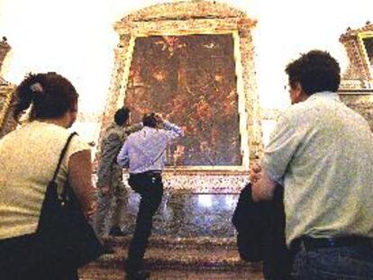 La obra <i>El martirio de San Lorenzo</i>, de Tiziano, en el Monasterio de El Escorial.