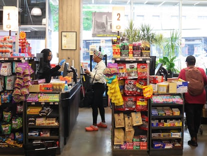 People shop at Lincoln Market