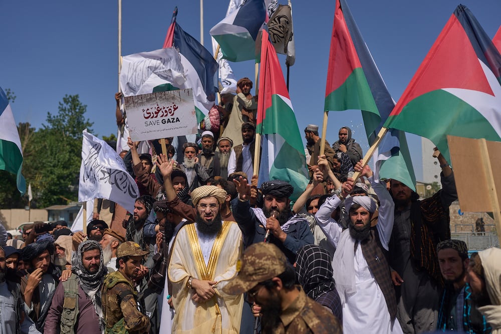 People attend a pro-Palestinian protest in Kabul, Afghanistan, Friday, May 30, 2025. (AP Photo/Bram Janssen)