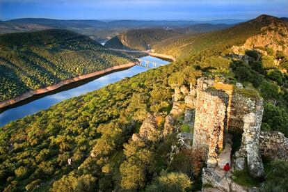 At this extraordinary, 18,000-hectare Mediterranean forest, one can enjoy stunning groves of trees and the sight of birds, including Spanish Imperial Eagles that are indigenous to the area. At the center of the park stands a tower, a ruin from the old castle of Monfrague (pictured). There, you can get the best view of the landscape.