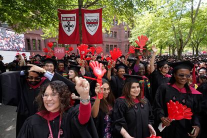 Graduating Harvard University students celebrate their degrees in Cambridge, Mass