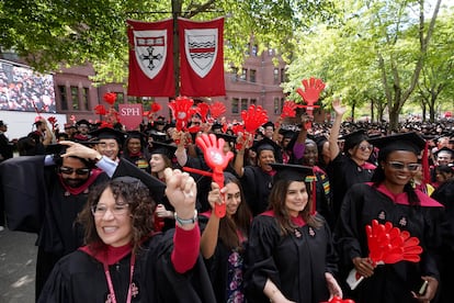 Graduating Harvard University students celebrate their degrees in Cambridge, Mass