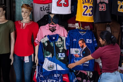President Nayib Bukele's face often adorns shirts for sale in downtown San Salvador.
