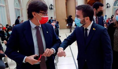 Salvador Illa (izq.) y Pere Aragonès el 12 de marzo durante la sesión constitutiva del Parlament.