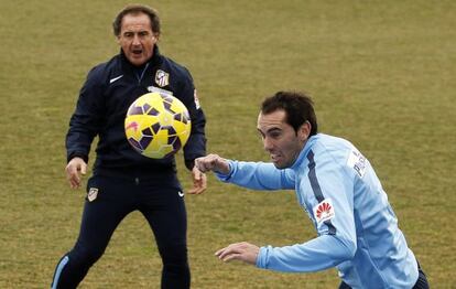 Godín, con el Profe Ortega