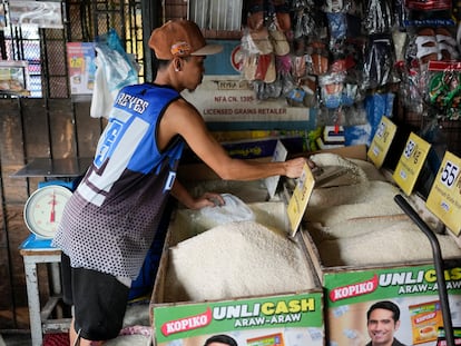 A vendor sells rice at a store in Quezon city, Philippines, on Monday, Aug. 14, 2023.