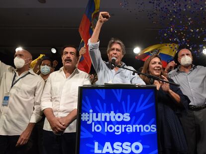Guillermo Lasso celebrates his win in the Ecuadorian presidential elections on Sunday in Quito.