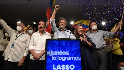 Guillermo Lasso celebrates his win in the Ecuadorian presidential elections on Sunday in Quito.