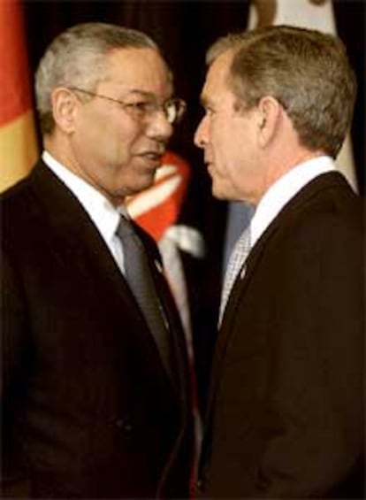 Powell (izquierda) junto a Bush, en una foto de archivo.