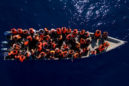 Migrants from Eritrea, Libya and Sudan sail a wooden boat before being assisted by aid workers of the Spanish NGO Open Arms, in the Mediterranean Sea, on June 17, 2023.