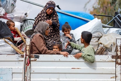 Palestinians flee Rafah after Israeli forces launched a ground and air operation, May 13, 2024. 