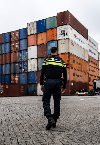 Sergeant Reiners De Groen of the Rotterdam Police patrols the port area. An ocean of thousands of shipping containers lines Europe's largest port, a giant that employs more than 100,000 people.