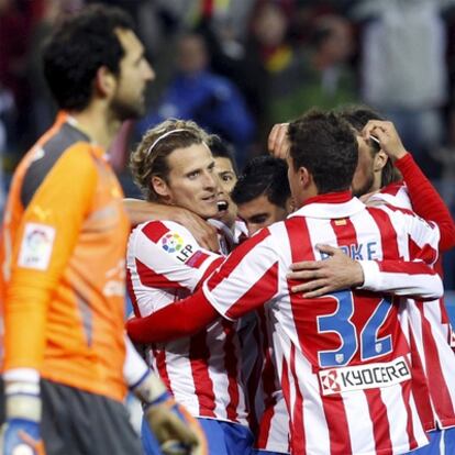 Los jugadores del Atlético celebran un gol.