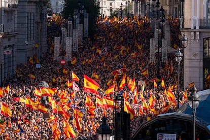 Crowds with Spanish flags pack Puerta del Sol during a protest called by Spain's Popular Party in Madrid on November 12.