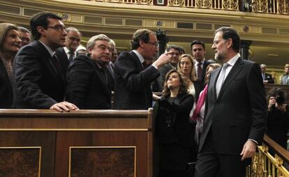 Mariano Rajoy rodeado de algunos ministrables.