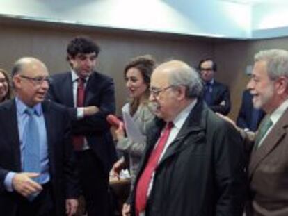 El ministro de Hacienda, Crist&oacute;bal Montoro, a su entrada al Consejo de Pol&iacute;tica Fiscal y Financiera celebrado hoy en Madrid.