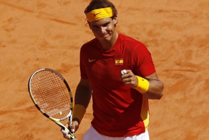 Nadal celebrates after a point in his match against Tsonga.