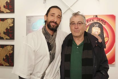 Adrien Brody y Robert de Niro en la exposición del actor.