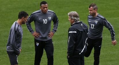 Pellegrini, con Weligton, Baptista y Duda.
