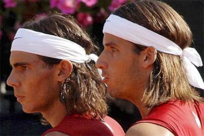 Rafa Nadal y Feliciano López, durante el partido de ayer.