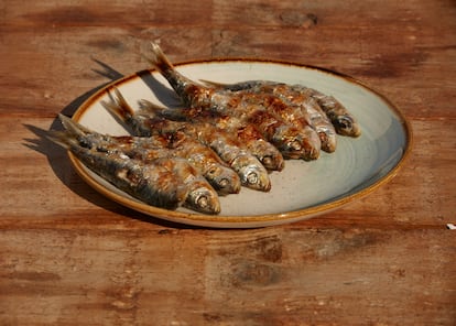   A plate of sardines cooked on a spit at the La Mar Bonita restaurant, where Miguel León cooks.