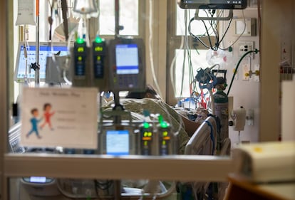 A pregnant and intubated Covid-19 patient lies in the Surgical Intensive Care Unit in a hospital in Boise, Idaho, on August 31, 2021.