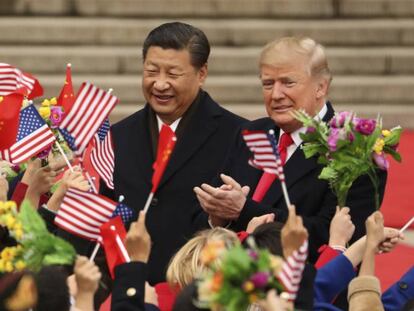 Donald Trump e Xi Jinping em novembro passado, em Pequim.