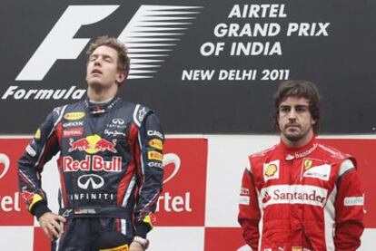 Vettel y Alonso, en el podio de India.
