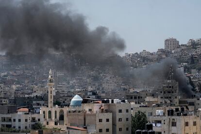 Smoke rises during an Israeli military raid of the militant stronghold of Jenin in the occupied West Bank, Monday, July 3, 2023.