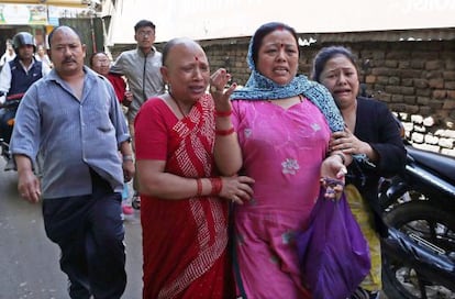 A new quake hit Nepal on May 12, sending local residents in Sankhu out in search of open spaces to get away from falling debris.