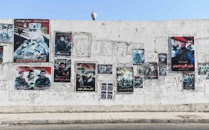 Un muro de Damasco con fotos de soldados del régimen fallecidos.
