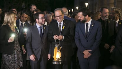 Aragonès, Torra i Torrent, amb la Flama del Canigó.