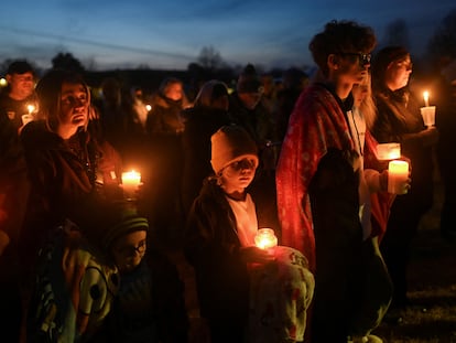 Members of the Brown family attend a vigil, after a shooting at Perry High School, in Perry, Iowa, U.S., January 4, 2024.