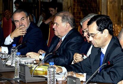 Solbes, Iglesias, Luzón y Caruana (de izquierda a derecha), ayer en el curso de la UIMP.