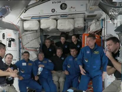 In this image from NASA TV, the four astronauts gather, during the welcoming ceremony, on the International Space Station, Friday, March 3, 2023.