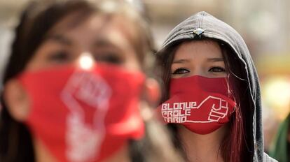 Manifestantes durante la marcha del 1º de Mayo, en Quito.