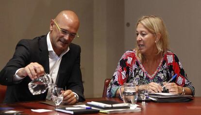 El conseller Raül Romeva i la vicepresidenta Neus Munté, en una imatge d'arxiu.