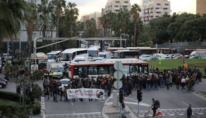 Protesters block a street in Barcelona during the strike on October 3.