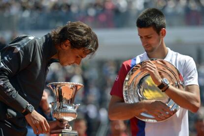 Rafael Nadal admires the Rome Masters trophy on Monday.