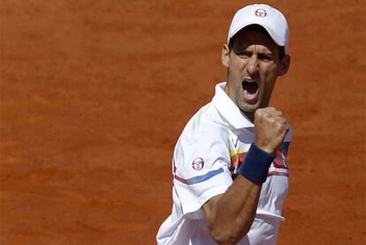 Djokovic celebra un punto durante el partido que se ha medido a Del Potro.