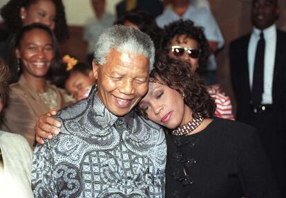 Con Whitney Houston en 1994.