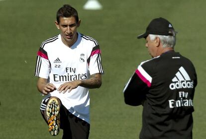 Di María i Ancelotti, durant un entrenament amb el Madrid