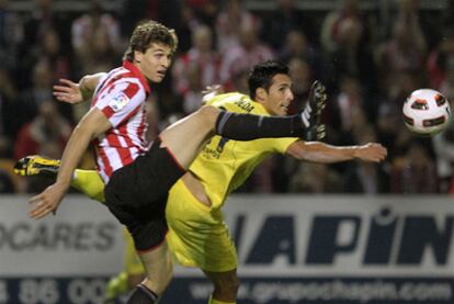 Llorente y Rueda durante el partido